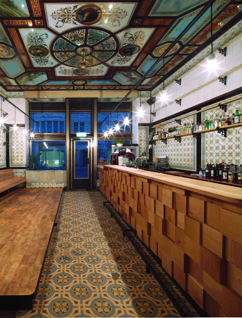 michael grzesiak transforms a century old butcher shop into a bar