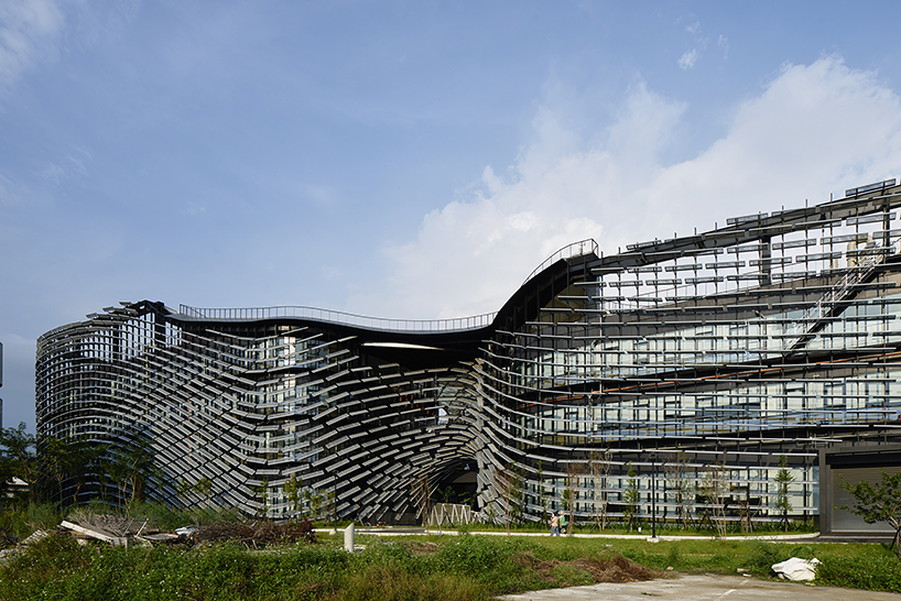 noiz architects clads innovation campus in taiwan to resemble swimming fish