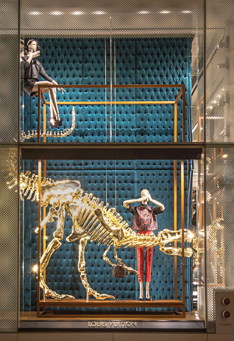 louis vuitton&#39;s gilded dinosaur skeleton window installation