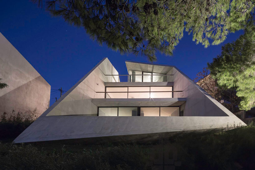 tense architecture network embeds home into a greek hill 