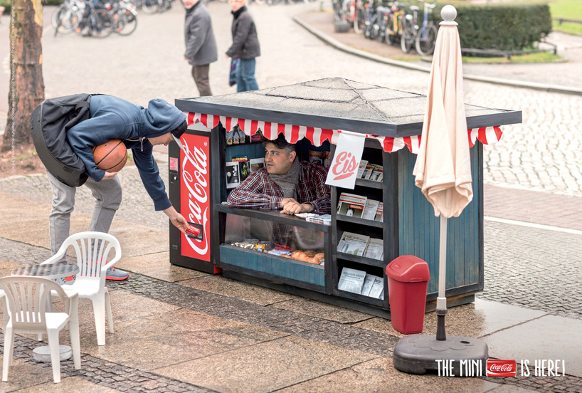 coca-cola mini kiosks by ogilvy & mather berlin promote tiny coke cans