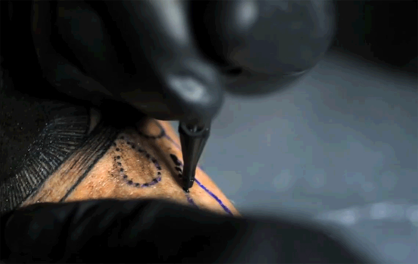 GueT slow motion tattoo video