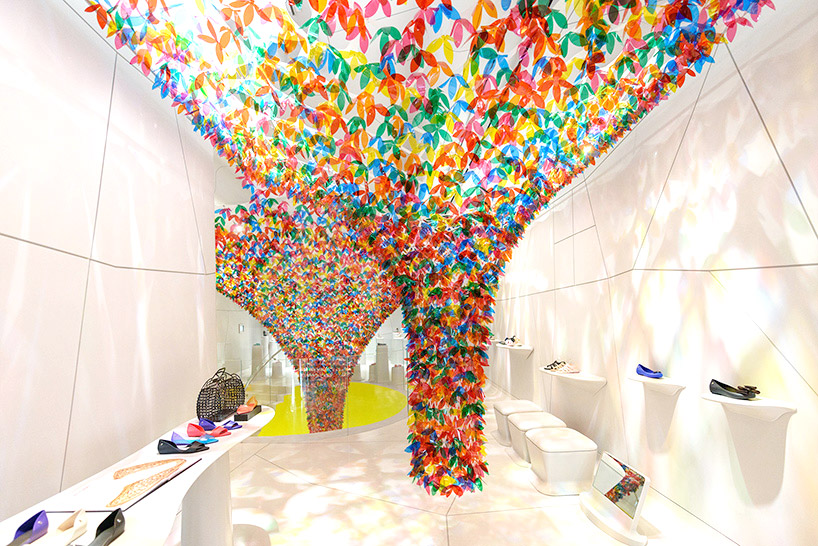 SOFTlab colorizes shoe gallery in new york with flower canopy
