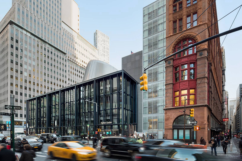 new york's fulton center transit hub topped with giant sky