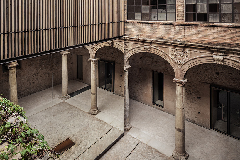 palau-castell renaissance cloister renewal by e