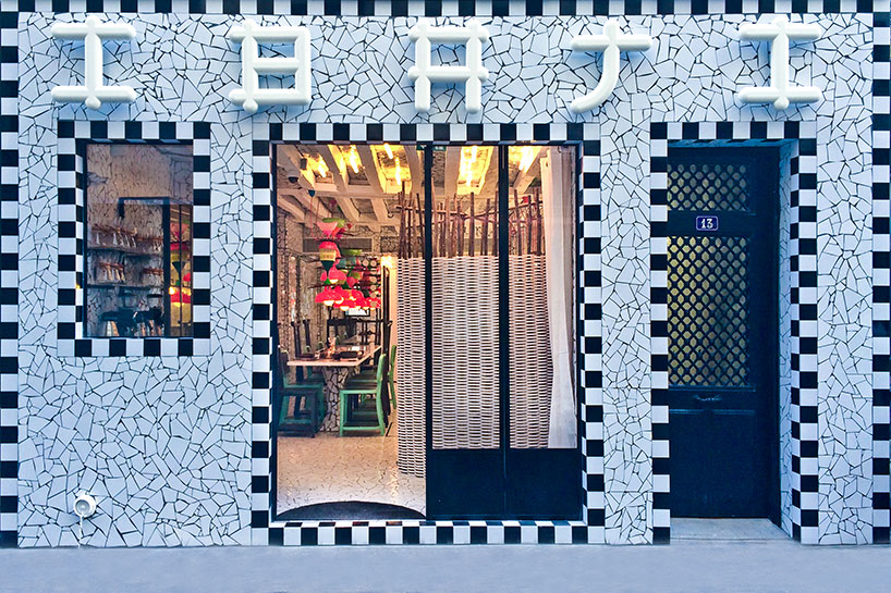 paola navone wraps ibaji restaurant in fragmented tiles