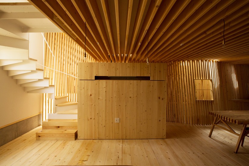 timber slats delineate triangle house by life style koubou