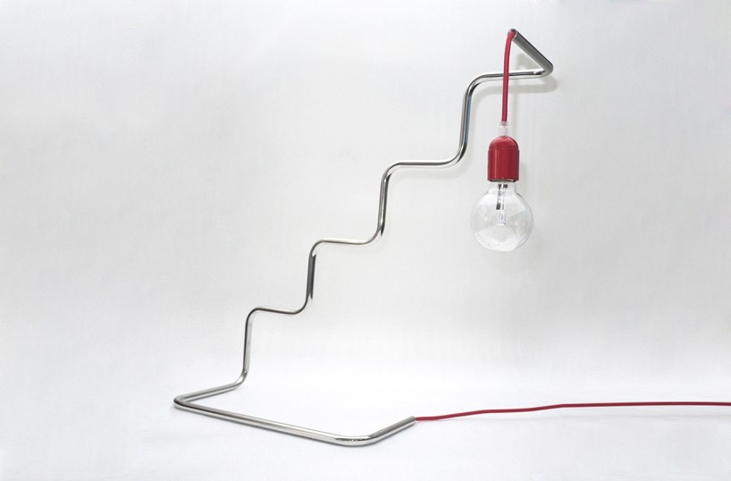 pietro travaglini creates tubino series of seemingly unstable lamps