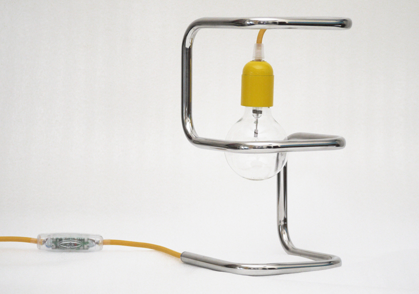 pietro travaglini creates tubino series of seemingly unstable lamps