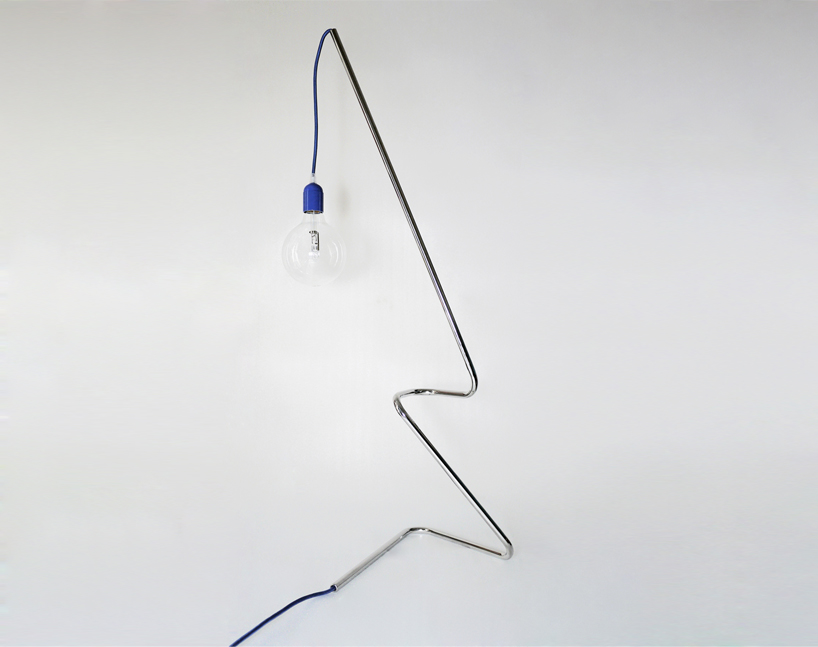 pietro travaglini creates tubino series of seemingly unstable lamps