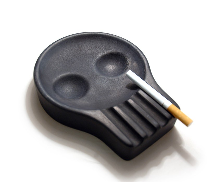 ash tray skully prods smokers to quit with functional form