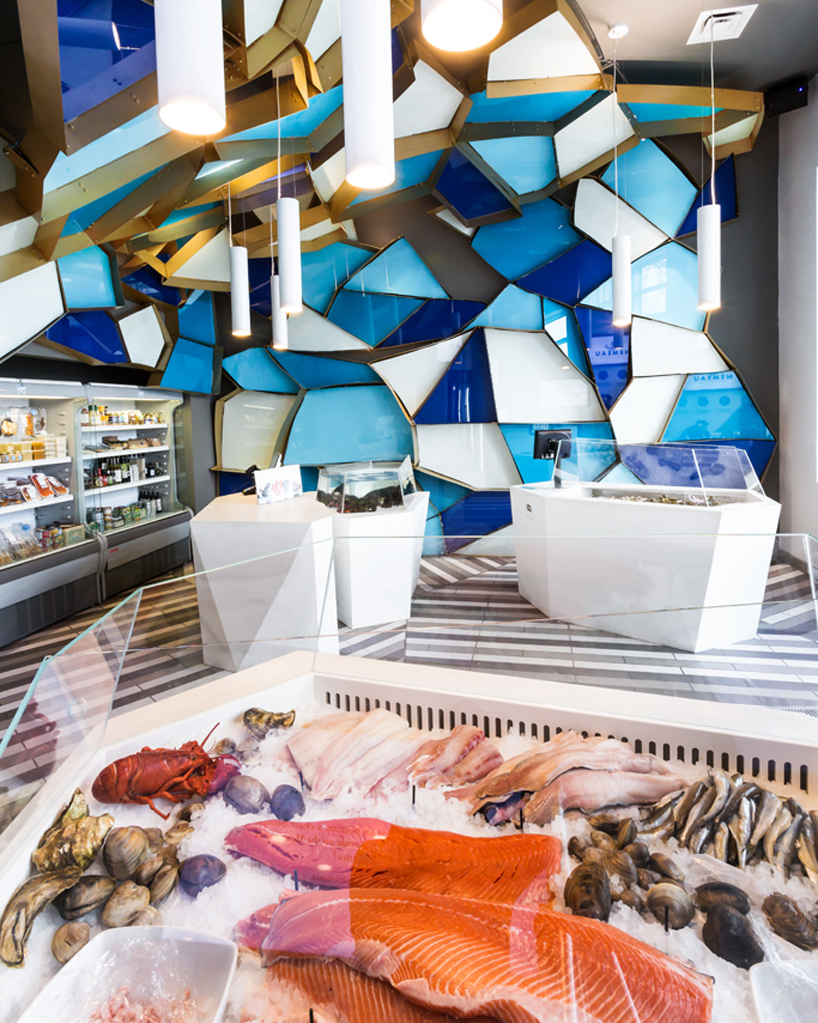jean de lessard wraps némeau seafood shop in quebec city with glass prisms