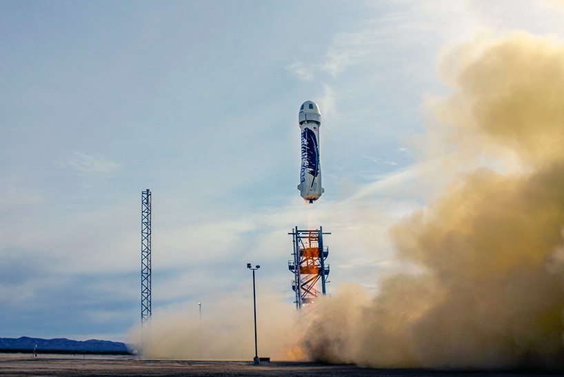 blue origin’s reusable new shepard rocket booster successfully lands in