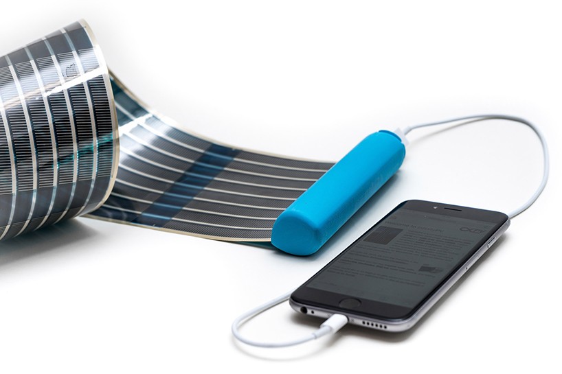 ... on portable battery fits retractable solar panel to charge smartphones