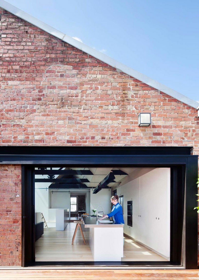 andrew simpson converts 19th century warehouse into light-filled home in melbourne