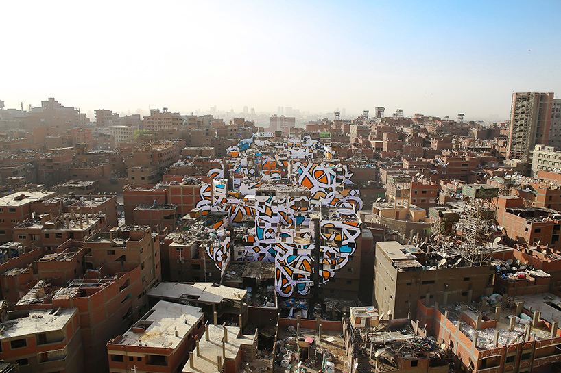 eL Seed challenges cultural perceptions with city-scale anamorphic art in cairo