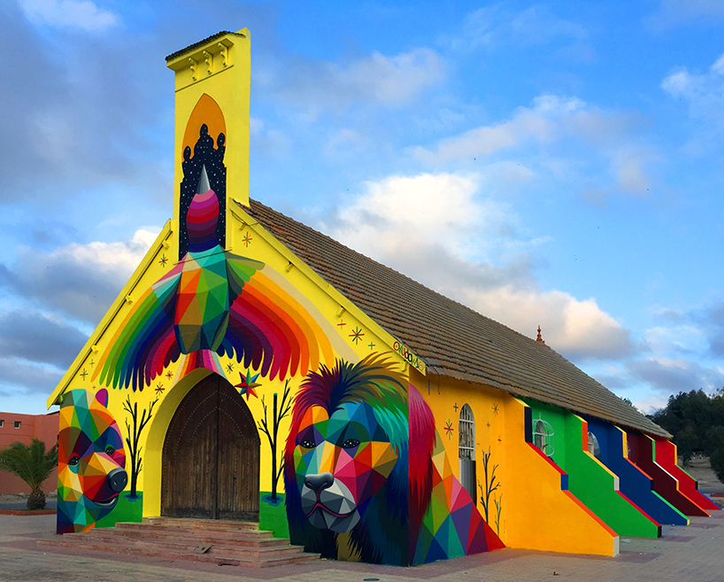 okuda san miguel paints colorful characters on abandoned church in morocco