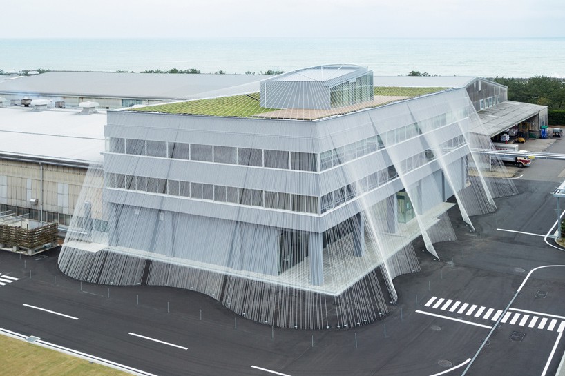 kengo kuma protects japanese office building with carbon fiber curtain