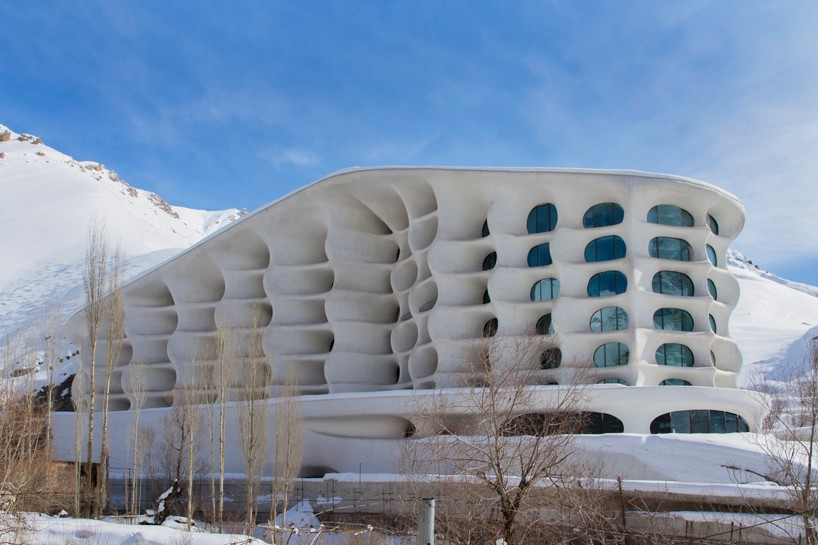 RYRA studio sculpts iranian ski resort to blend into its snow-capped mountain landscape