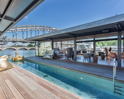 the floating OFF hotel docks by the riverbank of the seine in paris