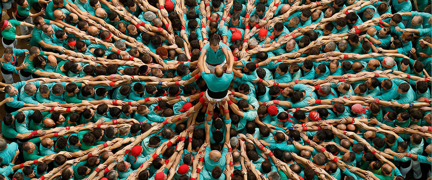 human towers pile up for the for the 26th concurs de castells in catalonia, spain