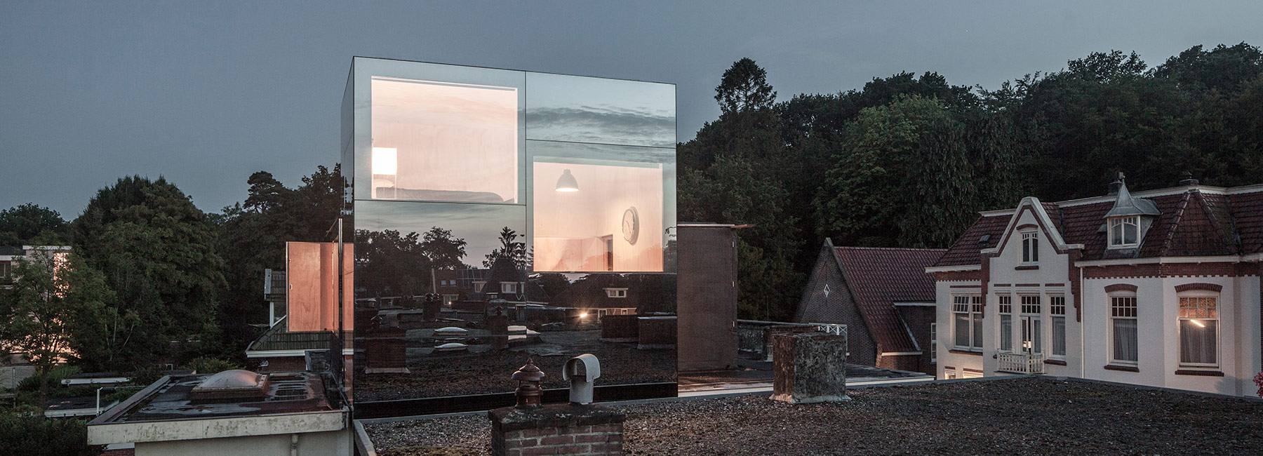 remco siebring's mirror mirror on a roof acts like a reflective tree house