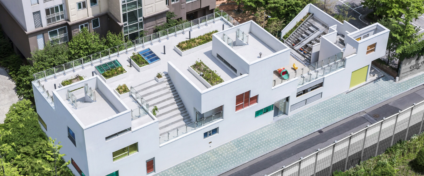 iroje khm architects creates quirky 'tetris nursery' in south korea