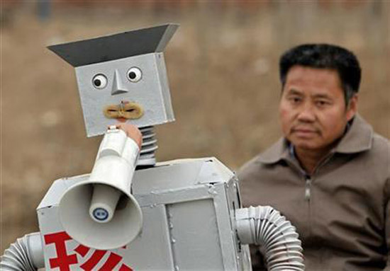 chinese farmer home made robots at shanghai world expo