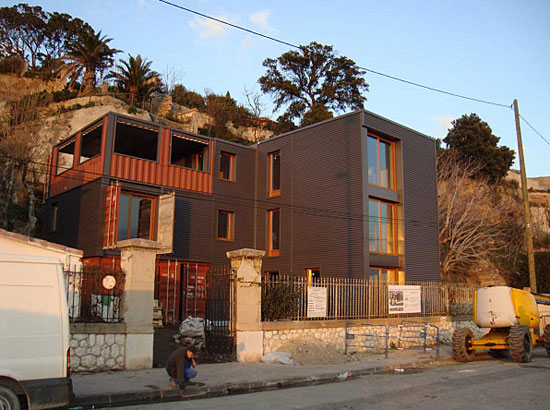 house made with 15 shipping containers