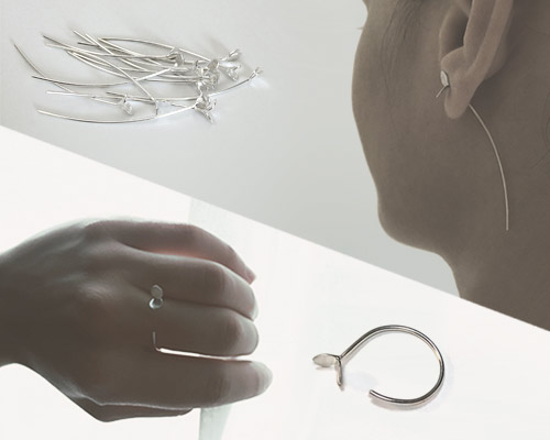 silver sprout ring and earing loop through fingers and earlobes