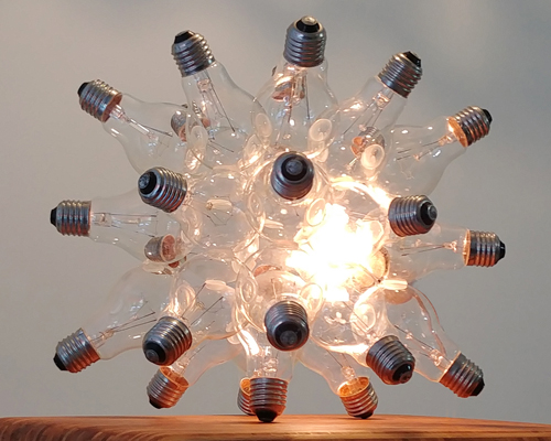 'spare' tablelamp constructed from 25 classic light-bulbs and 1 LED