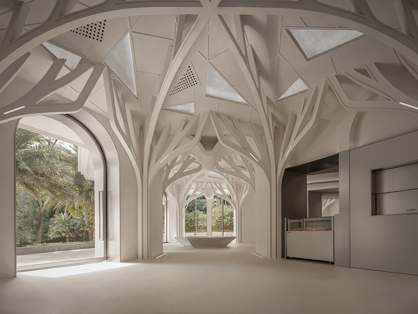 tree-shaped columns dominate '1/2 coffee & bar' on gulangyu island