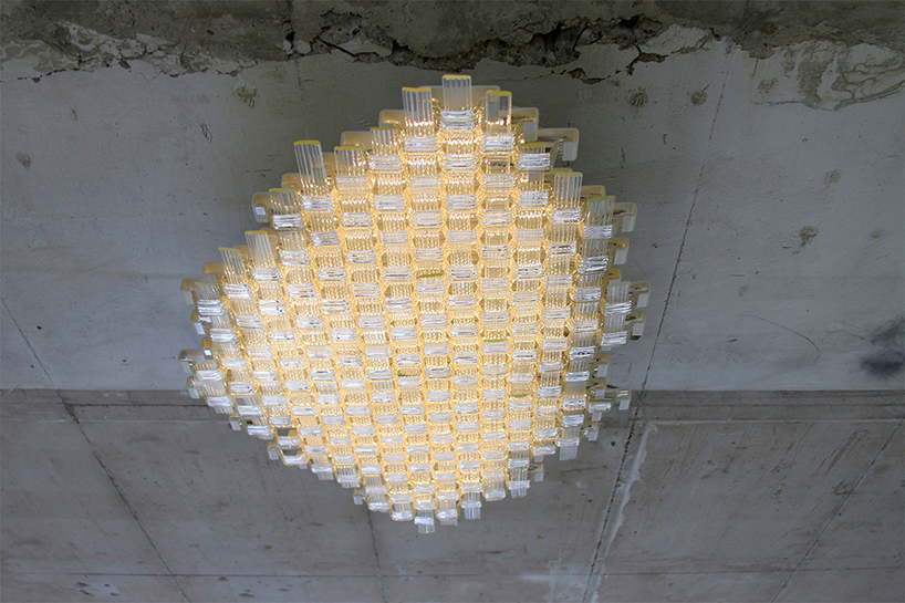 coma studio weaves lace nº1 light into glowing cloud formation
