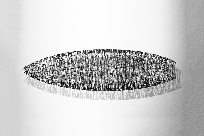 crafts surfboard from 10 million linear feet of carbon fiber