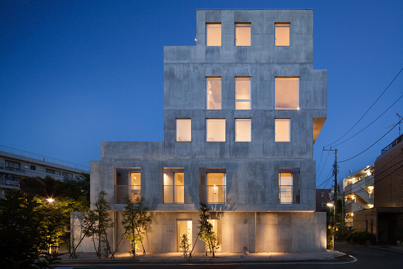 hiroyuki ito completes staggered concrete apartment building in tokyo