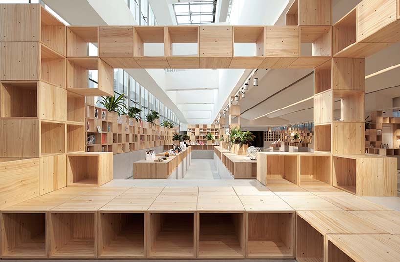 penda develops pixelated wooden interior for tech store