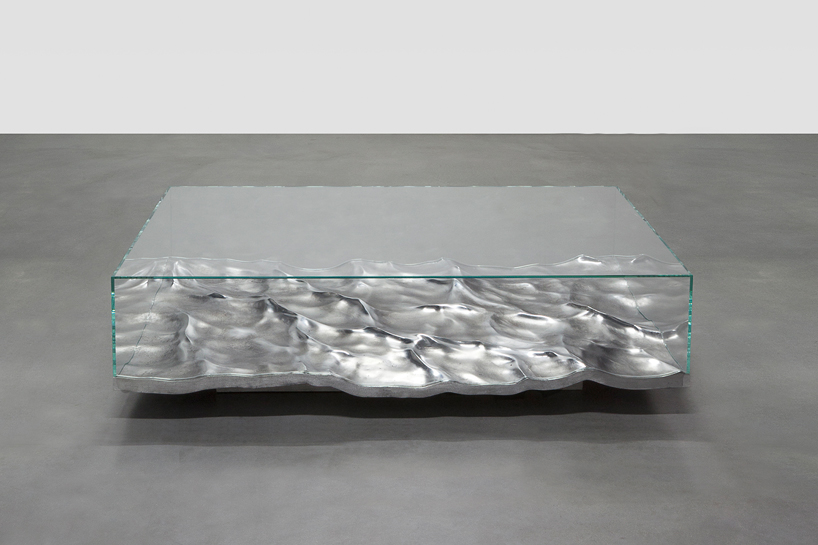 mathieu lehanneur fossilizes liquid marble + aluminum in table collection
