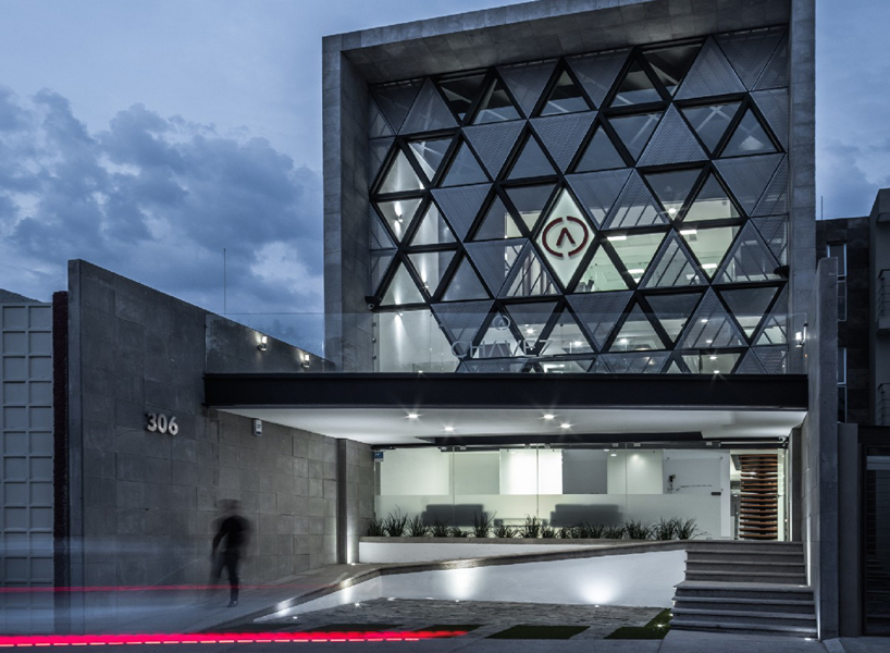 PLASTIK's mexican agency honors the company logo with its triangular  pattern facade