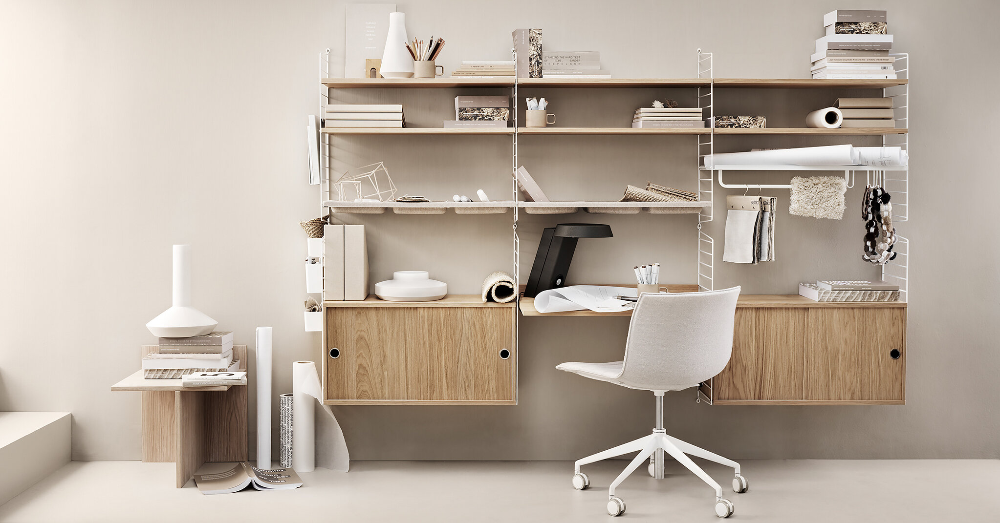 swedish icon string shelf tunes design to fit the flexible office