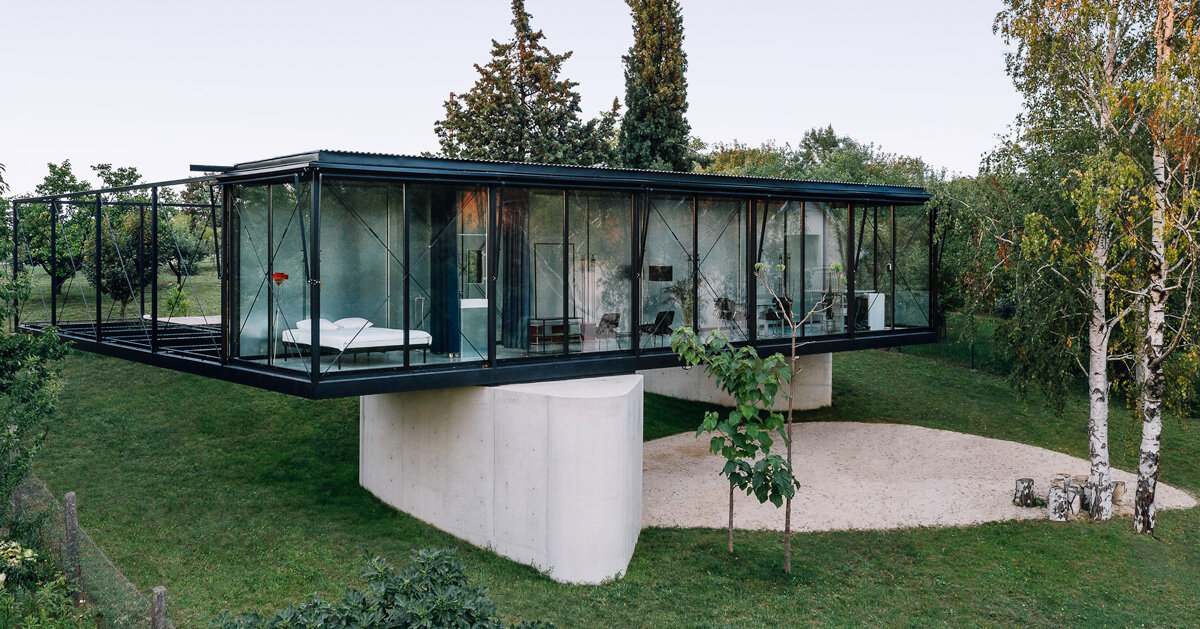 TEN studio sets steelframe house atop two boulderlike concrete