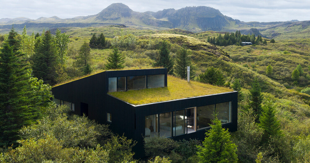 KRADS tops holiday home in iceland with green roof