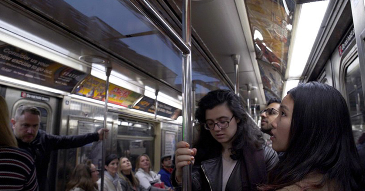 ian callender projects new york cityscape on the ceiling of moving