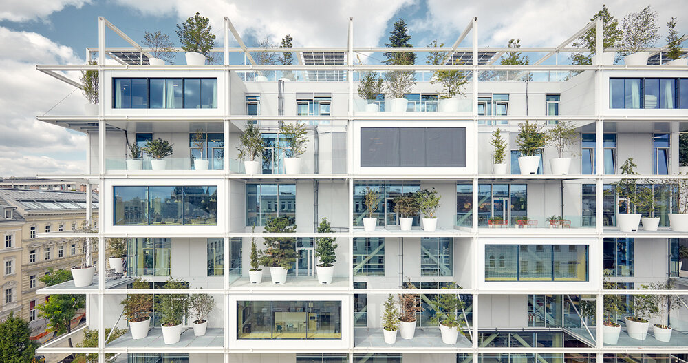 IKEA completes store in vienna, defined by green facade of huge 'shelving'