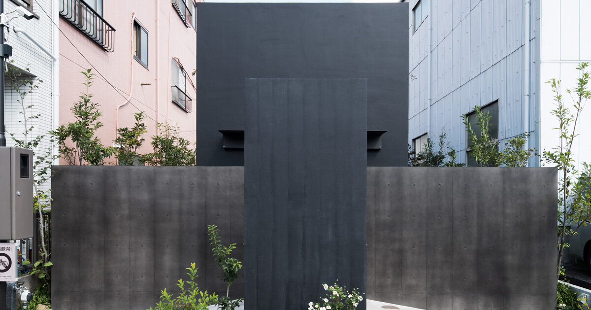 black tones unify japanese temple's ossuary + tree burial facility by