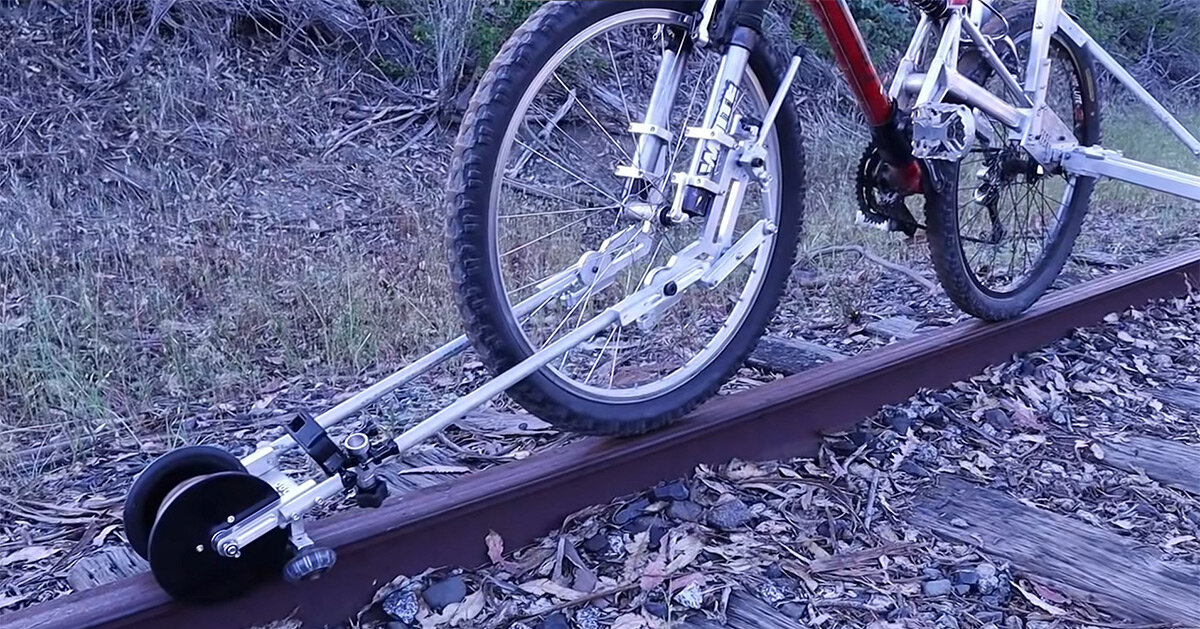 this foldable bike accesssory lets ride on abandoned railways