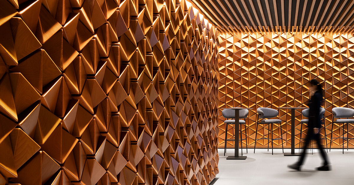 andrea maffei architects clads milan’s DAV restaurant interior in pyramid wooden panelling