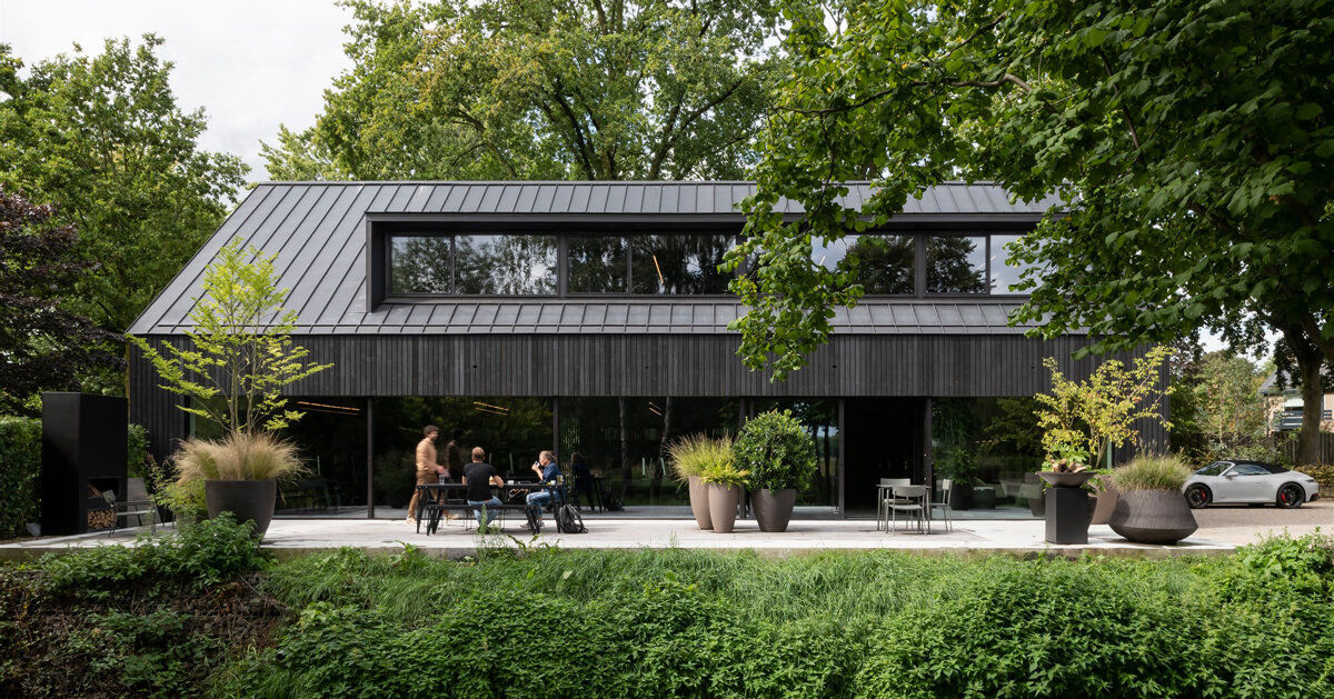 studio] [space nestles black barn office into the dutch landscape