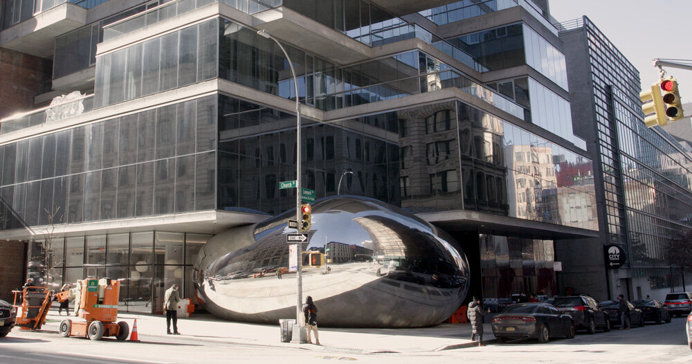 anish kapoor's newest 'bean' nestles into the streets of new york