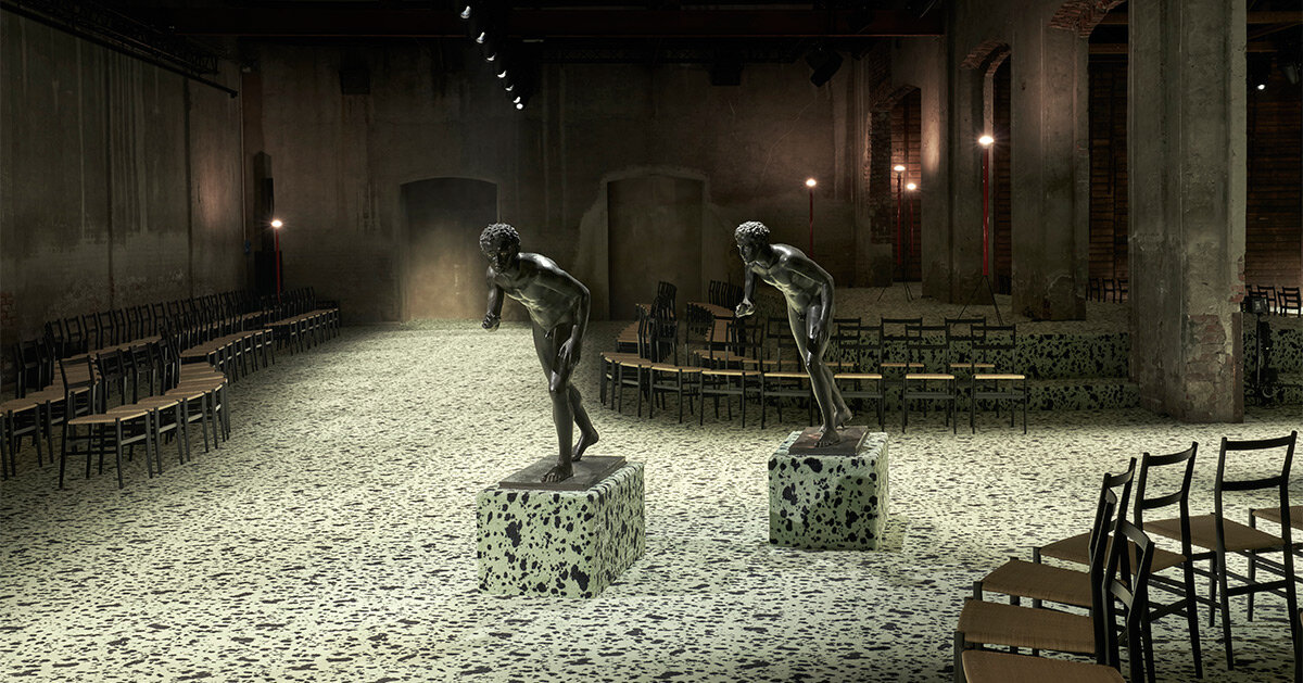 bottega veneta FW23 show unfolds among futurist boccioni statue