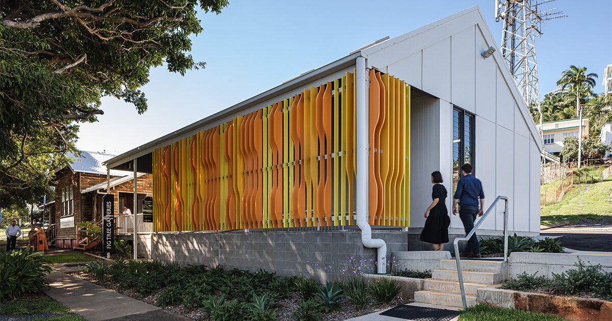 colorful timber screen with hidden morse code message decorates art gallery in australia